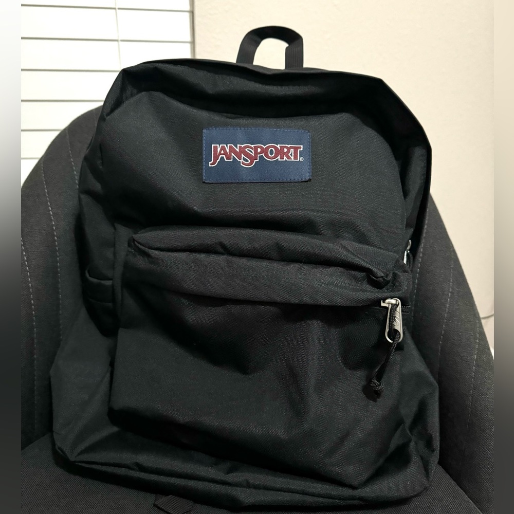 JanSport backpack, Black. Polyester backpack, lightweight